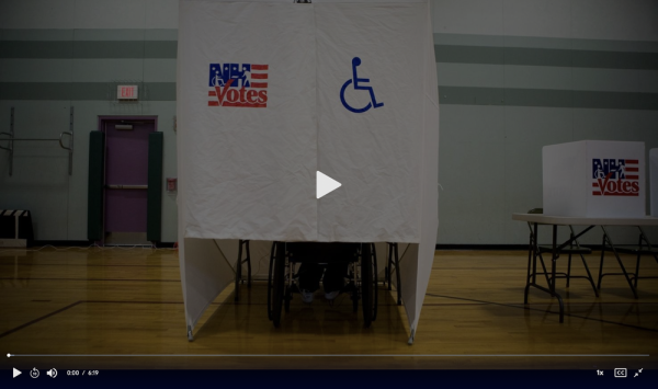 Video screenshot showing voting booth