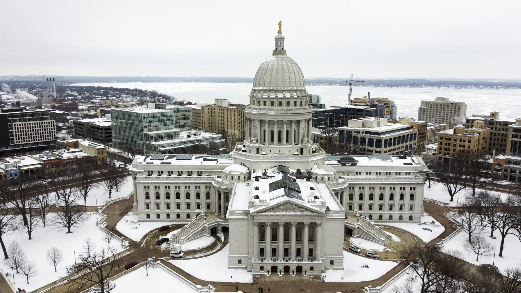 wisconsin state capitol with a snowy backdrop outside